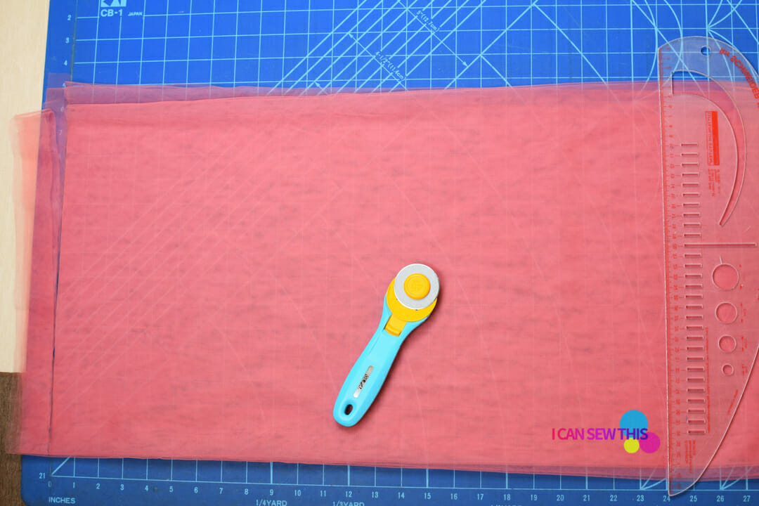 tulle fabric, rotary cutter, acrylic ruler, self-healing cutting mat, cut tulle fabric with a rotary cutter