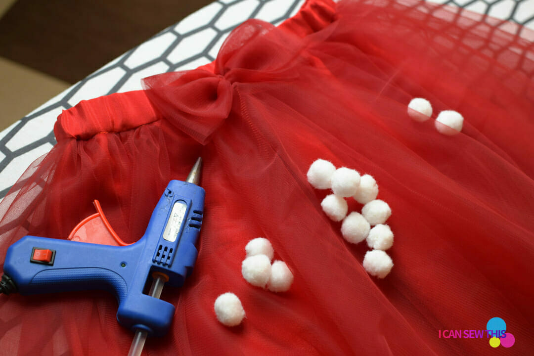 DIY Christmas tulle skirt, hot glue gun, pompoms