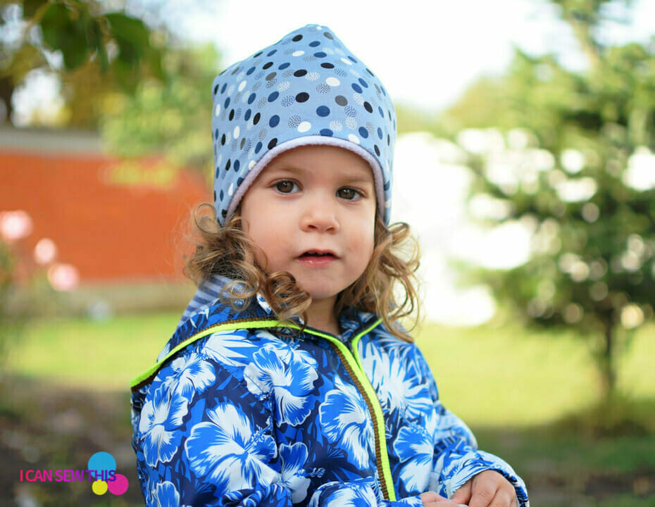 little girl wearing a DIY beanie hat lined with fleece