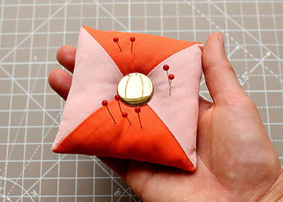 DIY two-colored fabric pincushion