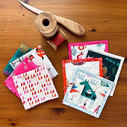 Mitered corner framed coasters by Quilter's Candy