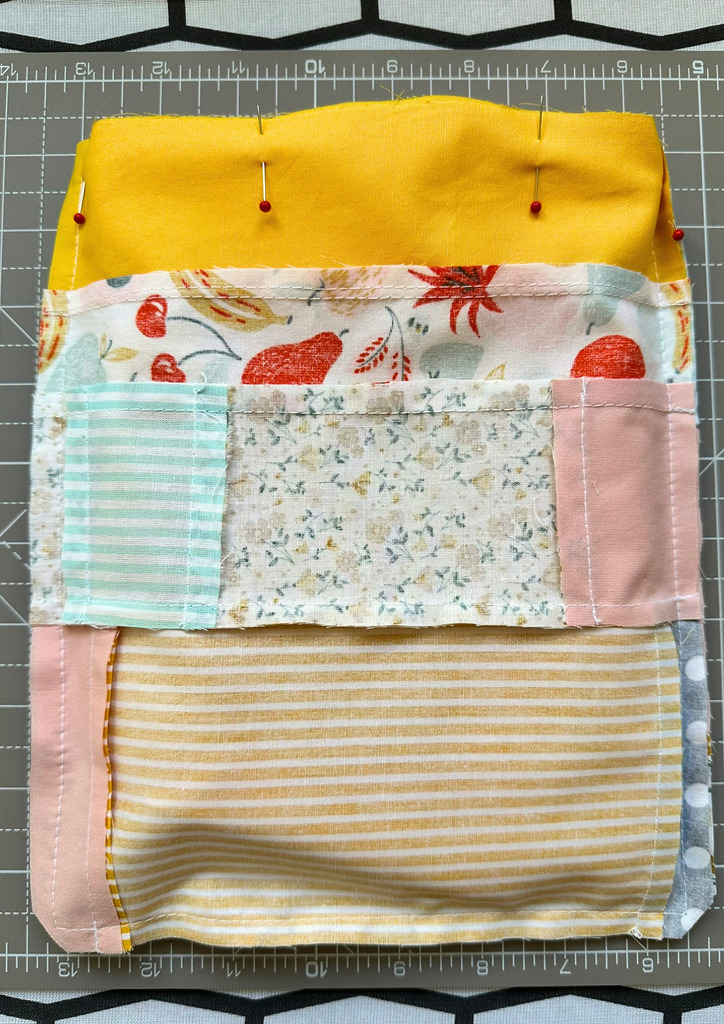 Lining nested inside the outer bag, right sides together, ready to be sewn at the top edge