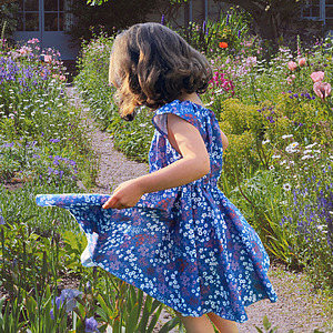 little girl wearing a twirly circle skirt dress