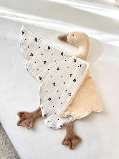 Aesthetic oversized goose plush by FomiAtelier