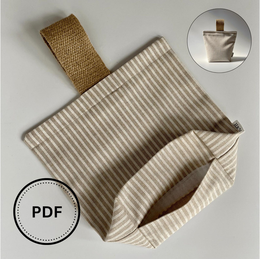 Refillable fabric doorstop