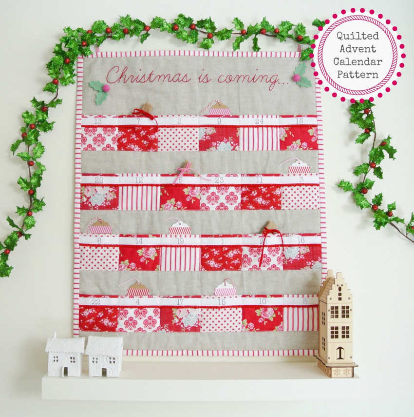 Quilted pocket calendar with pompom trim