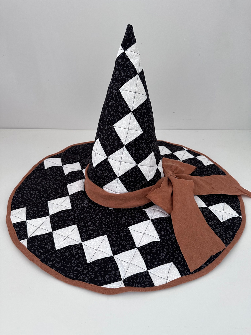 Strip-pieced quilted witch hat by Caroline Adams Home